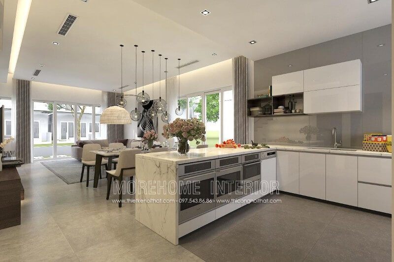 . Tủ bếp hiện đại được thiết kế liền kề với khu vực sinh hoạt chung sẽ giúp gia chủ có một không gian sống đầy đủ tiện nghi hơn.